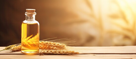 A bottle of wheat germ oil is placed on a wooden surface creating a captivating copy space image