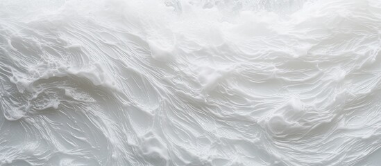 Obraz premium A close up copy space image of frothy water formed as a stream cascades