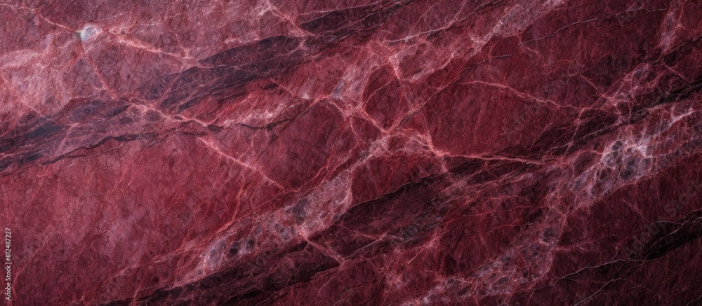 Poster Close up image of a polished dark red granite background with a textured natural appearance Ample space for inserting content