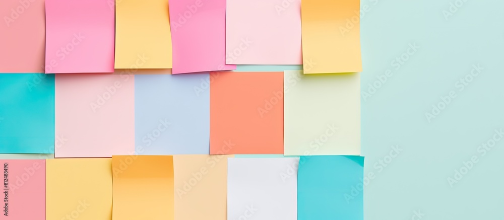Poster A minimal style flat lay with colorful sticky notes on a pastel background The image provides ample copy space and is captured from a top view