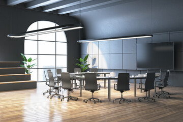 Modern meeting room interior with round table, wooden flooring, window with city view and empty mock up screen. Workplace concept. 3D Rendering.