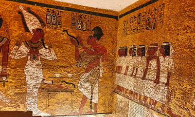 Wall relief of Pharoah Ay performing the opening of the mouth ritual on Tutankhamun inside the...