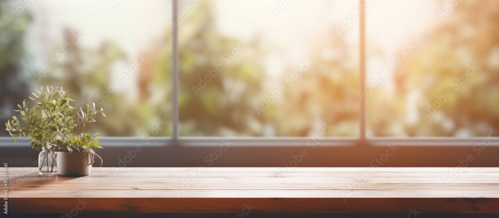 Poster A background image with a blurred window and a table in the foreground providing space for copy. Creative banner. Copyspace image