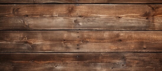 Fototapeta premium The copy space image depicts an aged wooden background