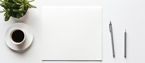A blank stationery set is placed on a white paper background creating a template for branding identity It is ideal for graphic designers to showcase in their portfolios The image is a flat lay with a