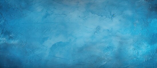 Abstract stucco background with a textured blue decorative plaster or concrete An art stylized banner that offers ample copy space for text