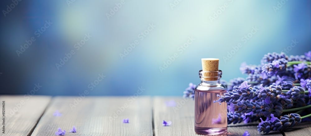 Poster a relaxing lavender essential oil with its soothing aroma captured on a beautiful blue textured wood