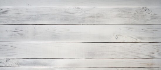 Fototapeta premium A background with a texture resembling white wood plank providing ample space for incorporating images or text