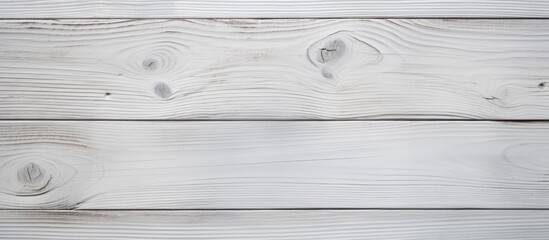 Fototapeta premium A background with a texture resembling white wood plank providing ample space for incorporating images or text