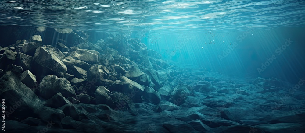 Poster Underwater rocks create an abstract water texture in this image providing ample copy space