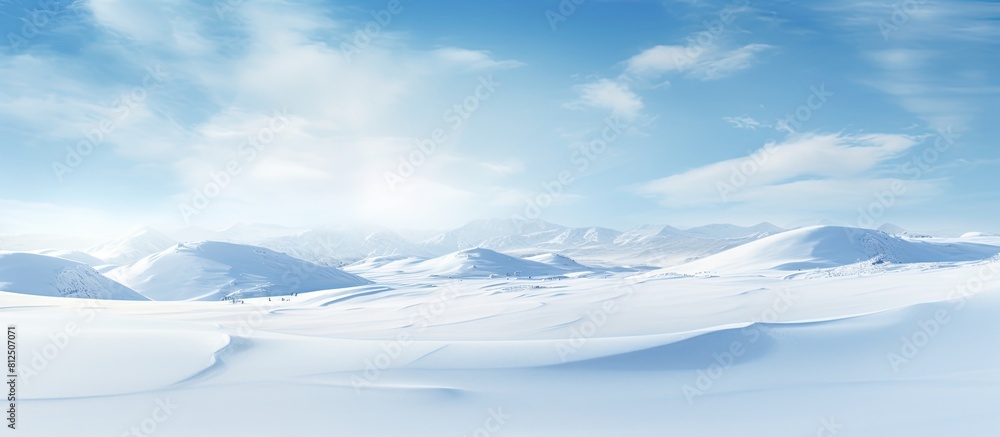 Poster Winter landscape with snowy ground and wind sculpted patterns on the snow surface creating a wide panoramic background The natural snow texture adds to the beauty of the copy space image