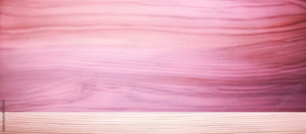 Poster a pink toned wooden board texture with a blurred effect creates an abstract background and design co