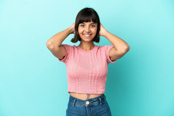 Young mixed race woman isolated on blue background laughing