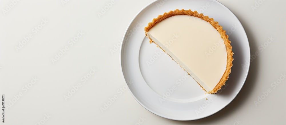 Aufkleber top view of a slice of homemade sugar cream pie on a white plate the plate is placed on a gray surfa