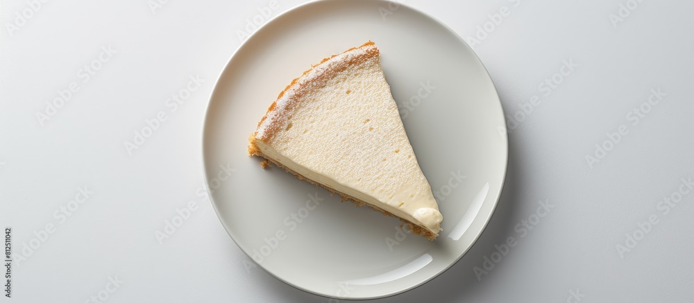 Aufkleber top view of a slice of homemade sugar cream pie on a white plate the plate is placed on a gray surfa