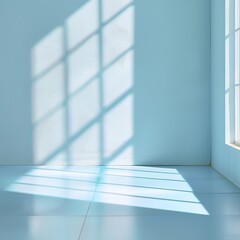 Blue-tinted sunlight casting geometric shadows through a window onto a clean white room floor