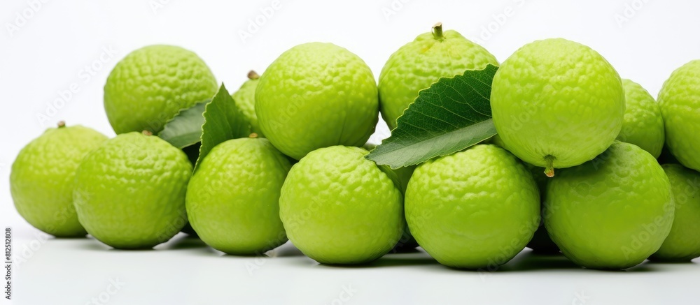 Poster fresh spondias dulcis fruit with a vibrant green color showcased on a clean white background providi