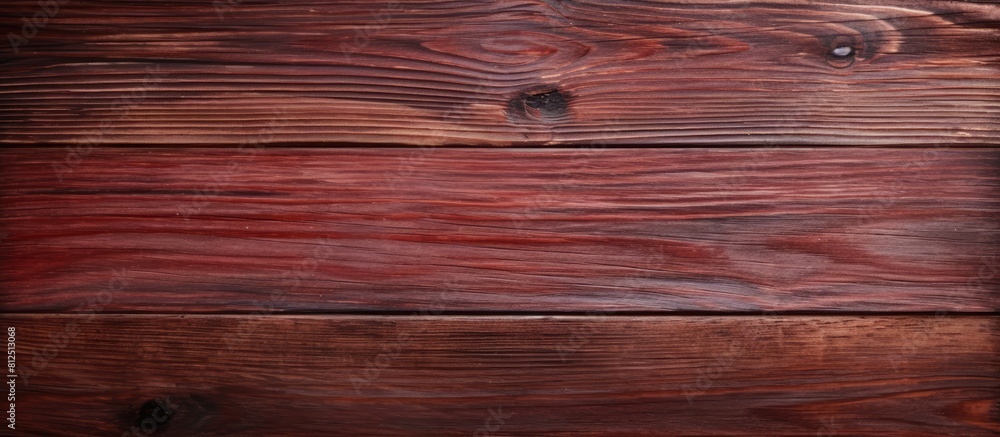 Poster View from above of an old wooden table with a natural dark red wood texture background surface that features an intricate natural pattern Copy space image