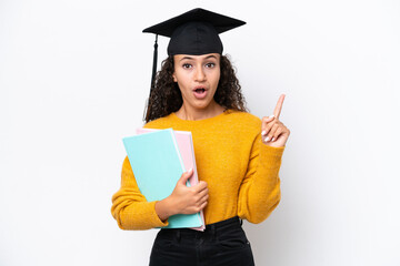 Arab university graduate woman holding books isolated on white background intending to realizes the...