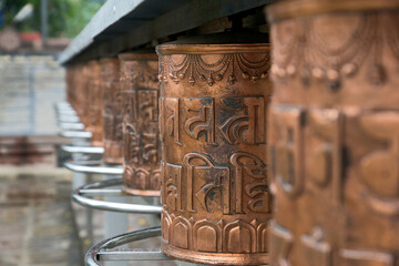 Sarnath, India: prayer mill. The buddha temple is at the place where Buddha preached for the first time