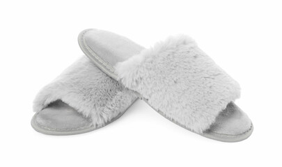 Pair of soft slippers with fur isolated on white