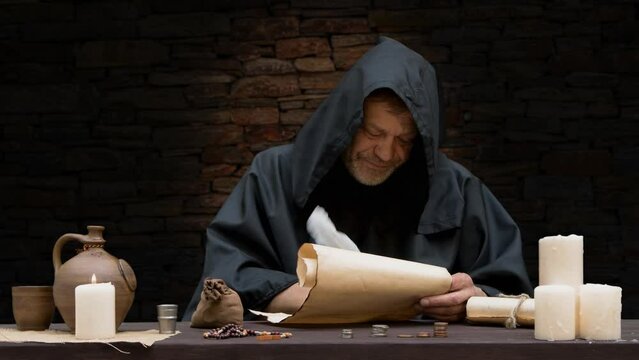A monk writing with a quill on parchment, counting money, medieval.