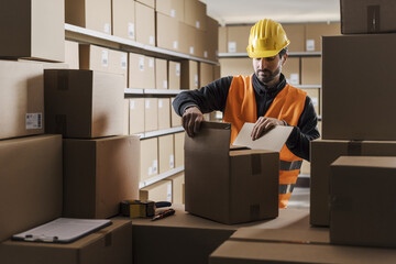Warehouse worker preparing a package