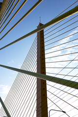 Yellow Cables On A Suspension Bridge Against Blue Sky In Bangkok