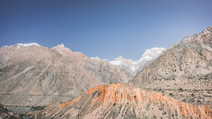 Mountain panorama of the Fan Mountains in Tajikistan, high peaks of rocks with snow