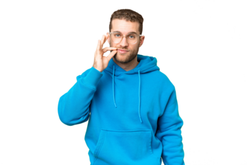 Young handsome blonde man over isolated chroma key background showing a sign of silence gesture