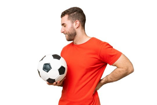 Handsome young football player man over isolated chroma key background suffering from backache for having made an effort - Powered by Adobe