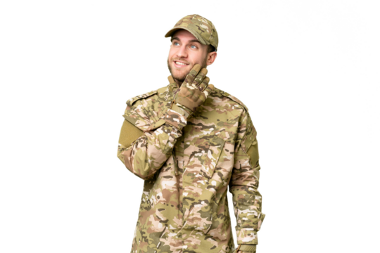 Military man over isolated chroma key background thinking an idea while looking up