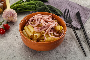 Italian cuisine - pasta tortiglioni with squid