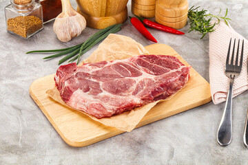 Raw pork neck steak for grill