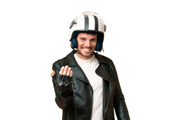 Brazilian man with a motorcycle helmet over isolated chroma key background inviting to come with hand. Happy that you came