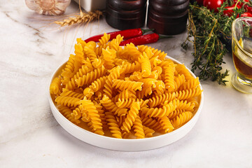 Italian dry pasta Fussili for bowl