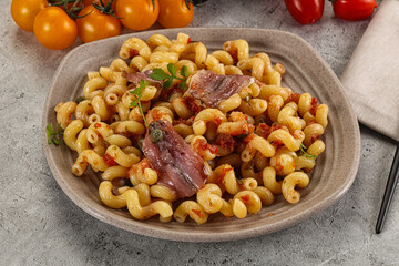 Italian pasta cellentani with anchovy