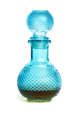 Blue bottle with the liquid isolated on the white background. Front view.