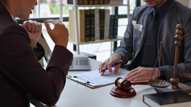 Lawyers provide legal advice and chat with clients via online tablets to clarify and give advice on the rules in contract documents that must be followed at the company correctly and fairly.