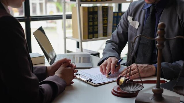 Lawyers provide legal advice and chat with clients via online tablets to clarify and give advice on the rules in contract documents that must be followed at the company correctly and fairly.