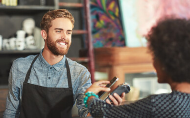 Barista, woman and phone for payment in coffee shop with service, help or happy for easy...