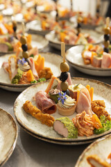 Gourmet canapés on decorated plates