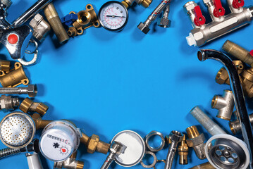 Plumbing water line equipment on the blue flat lay background. Plumbing service with copy space....
