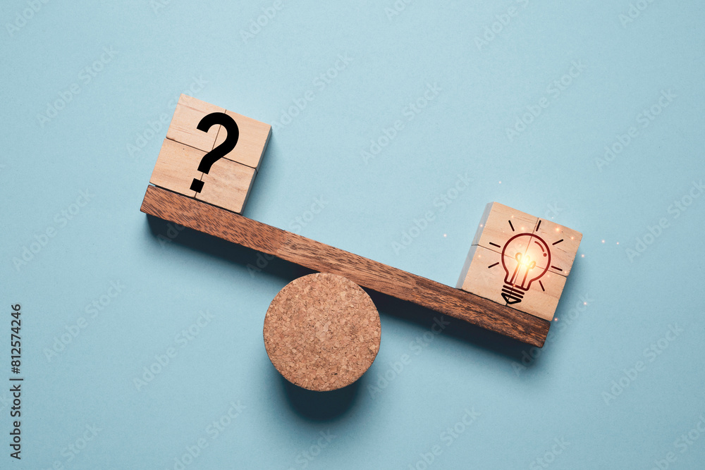 Poster unbalance on seesaw between question mark and glowing lightbulb for creative thinking idea and probl
