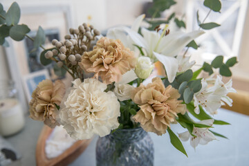 Decorative bouquet with carnations in a vase