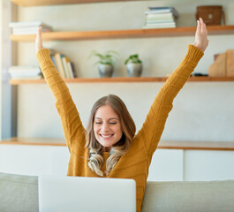 Woman, finished and laptop with smile, celebration and lounge for deadline as freelancer or...