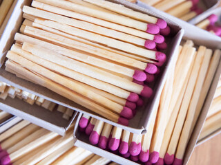 Organized Match Array. Boxes of matches with pink tips, neatly arranged. Uses for Safety content, product display.