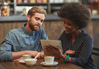 Couple, tablet and reading online in cafe with social media video, bonding and restaurant reviews....