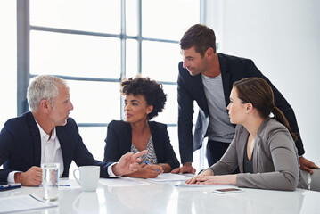Lawyer, group and paperwork in office with people, reading and thinking for problem solving at...
