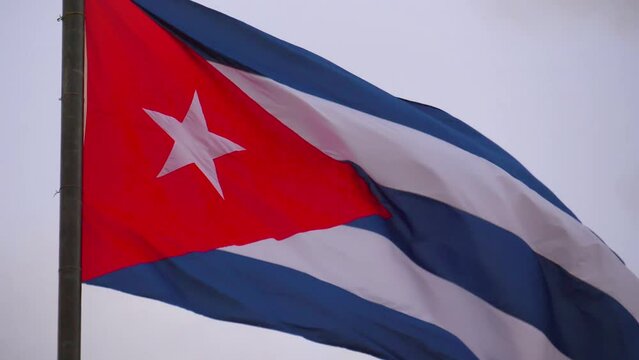 CUBA flag background, slow motion, close up. Realistic Cuba Flag background. Waving Cuban Flag Background. Cuban Flag Close-up. National Patriotism And Celebration With Banner Flying.